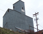 E.C. Hay and Sons grain elevator in Harrison, Idaho, overlooks the Trail of the Coeur d'Alenes.